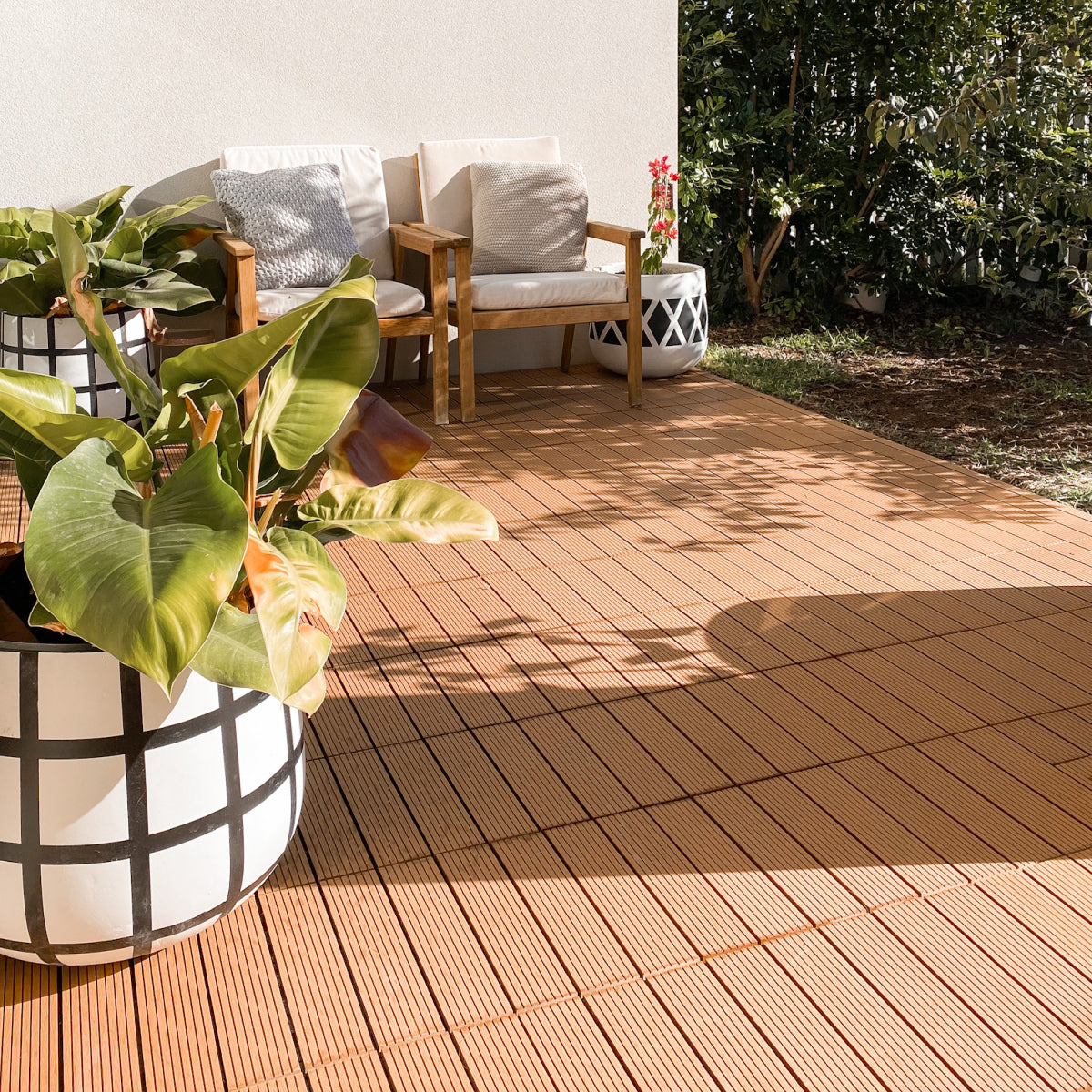 outdoor patio with teak patio tiles  creating a warm and natural flooring look for garden and backyard spaces 